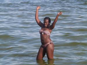Grace posed for the Mzungu in a bikini. 