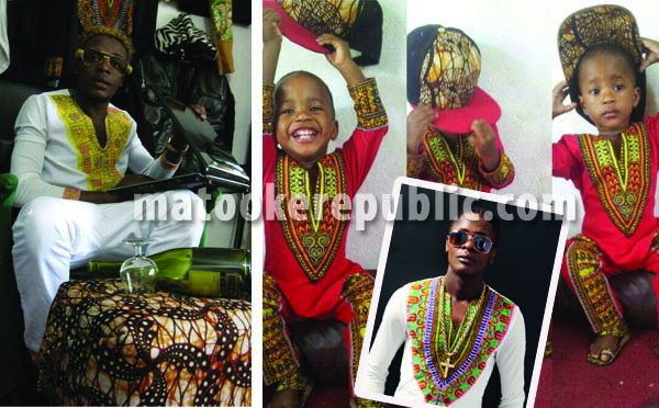 Cloud (R) and a little boy in Chameleone's Wale Wale video outfit. 