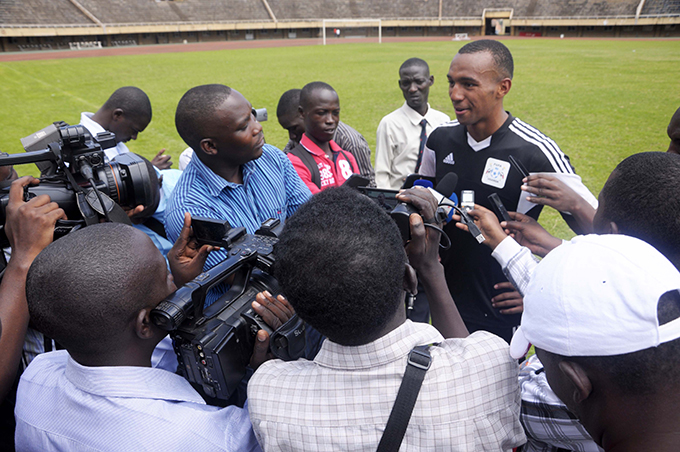 Lorenzen is mobbed by journalists at Namboole