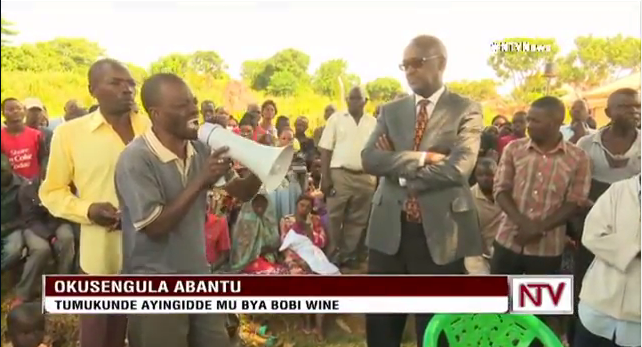Gen. Tumukunde with Busabala residents in an NTV screen grab. 