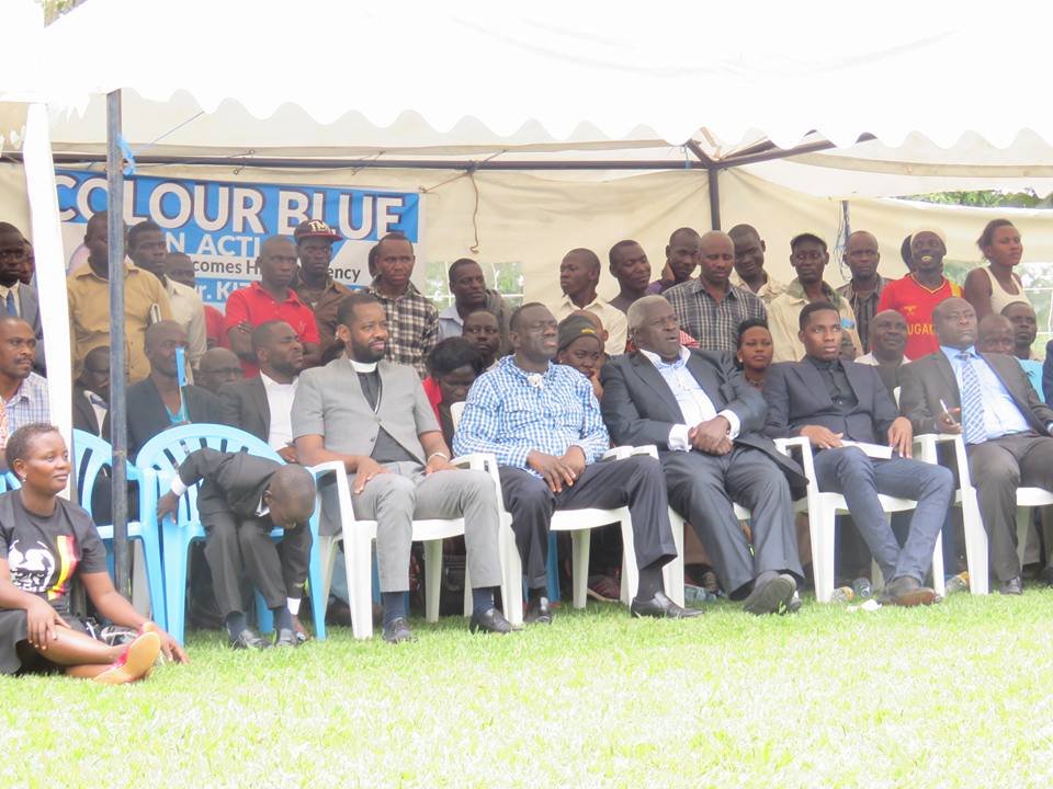 Besigye and other opposition figures at his home. 