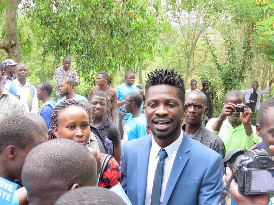 Bobi and Barbie at Besigye's Kasangati home during the opposition leader's press conference. 