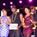 Bebe, Zuena and some of the Gagamel members with his trophies as Bebe holds a Huawei tab that came with winning the Best Male Artiste accolade.