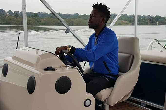Bobi Wine cruising on the lake in the new boat.