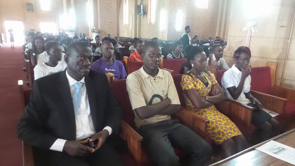 Besigye attending the service at Namirembe Cathedral.