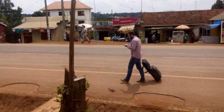 This Mzungu had to walk to the airport to catch his flight.