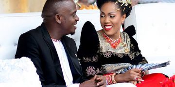 Pastor Geofrey Kayovu and Fyona. He promised that the official wedding day is soon.