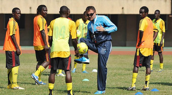 The Uganda National team, The Cranes coach Milutin Sredojevic demonstrates how it should be done during 2014 Chan Qualifier training at the Mandela Stadium, Namboole, Kampala on 08 June 2013 ©Ismail Kezaala/BackpagePix