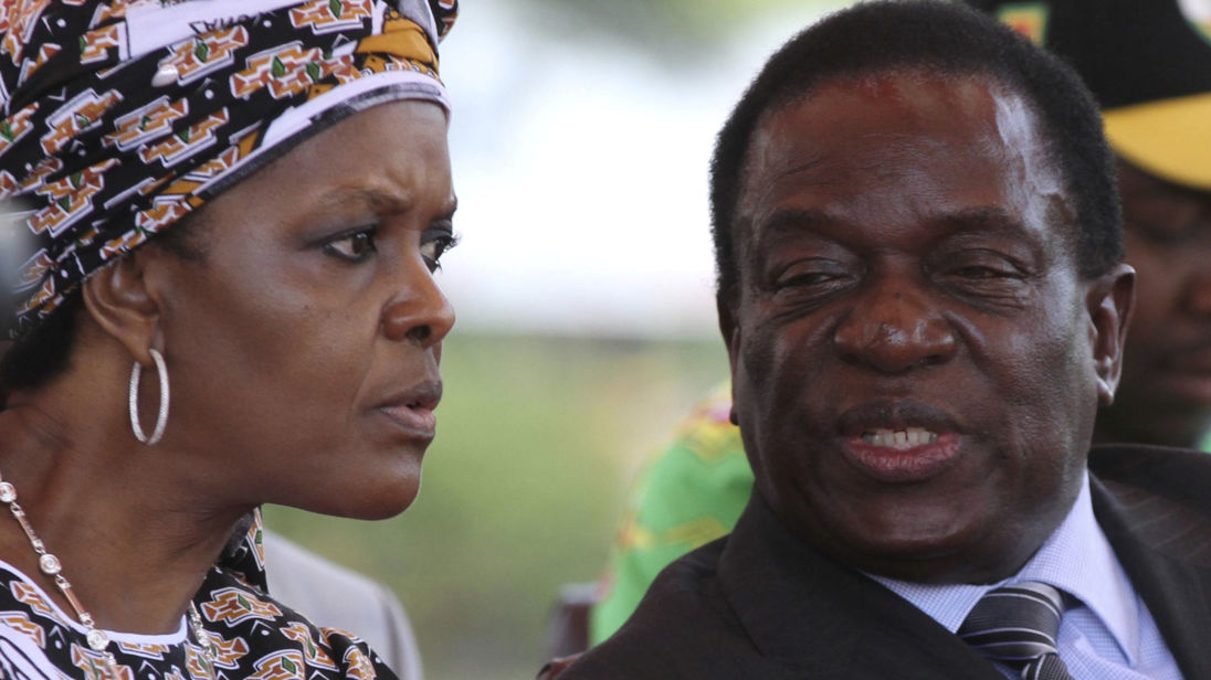 FILE PHOTO: President Robert Mugabe's wife Grace Mubage and vice-President Emmerson Mnangagwa attend a gathering of the ZANU-PF party's top decision making body, the Politburo, in the capital Harare, Zimbabwe, February 10, 2016. REUTERS/Philimon Bulawayo/File Photo - RC1C554ED5B0
