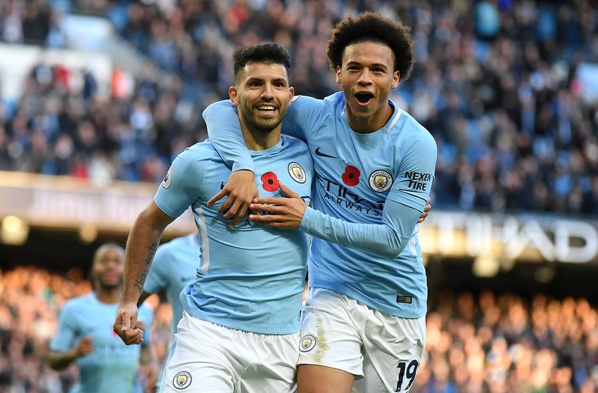 MANCHESTER, ENGLAND - NOVEMBER 05: Sergio Aguero of Manchester City celebrates scoring his sides second goal with Leroy Sane of Manchester City during the Premier League match between Manchester City and Arsenal at Etihad Stadium on November 5, 2017 in Manchester, England.  (Photo by Laurence Griffiths/Getty Images)