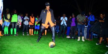 Cindy attempting a penalty shot last night at the Guinness Night Football in Mbale. PHOTOS BY ASIIMWE VINCENT SMOKY/Matooke Republic.