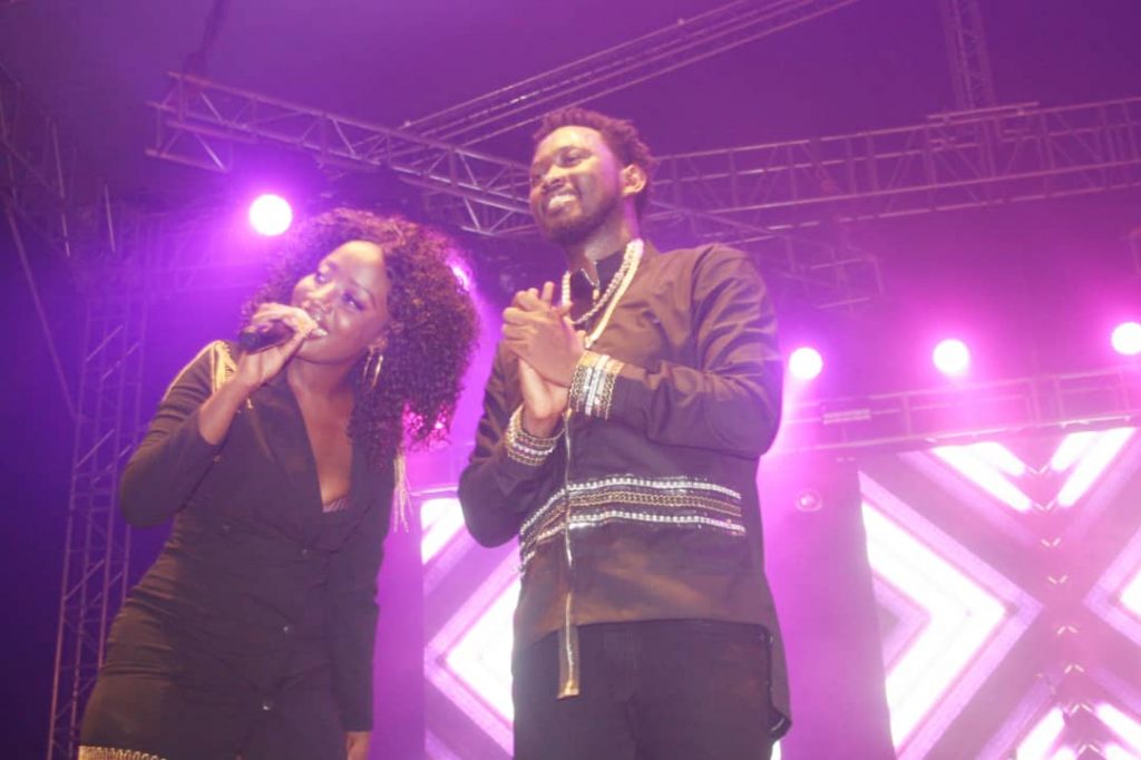 Levixone on stage with Lydia Jazmine. PHOTOS BY KASIGWA JOSEPH/Matooke Republic.