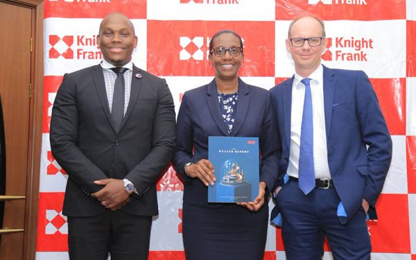 Vusi Thembekwayo with Knight Frank Uganda MD Judy Kyanda and Knight Frank Global editor of The Wealth Report Andrew Shirley at the launch of the report. COURTESY PHOTO.