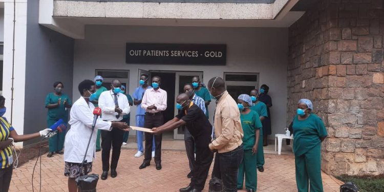 Patients receiving their discharge certificates at Mulago National Specialised Hospital. COURTESY PHOTO.