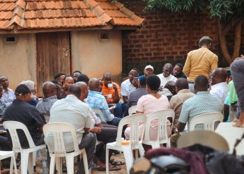 The family and friends of the late Kato Lubwama during a meeting at his home in Mutundwe.
