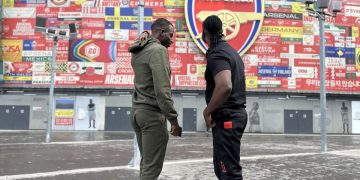 Alpha Thierry and Bebe Cool at Emirates Stadium.