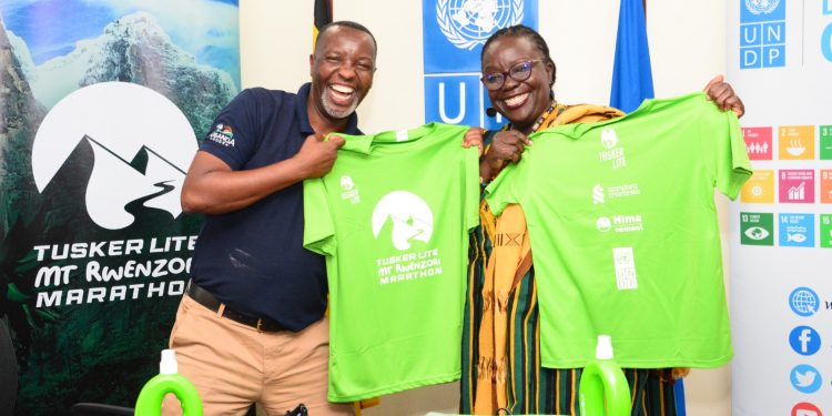 Amos Wekesa (left) and Elsie Attafuah during the kit unveiling ceremony at the UNDP headquarters.