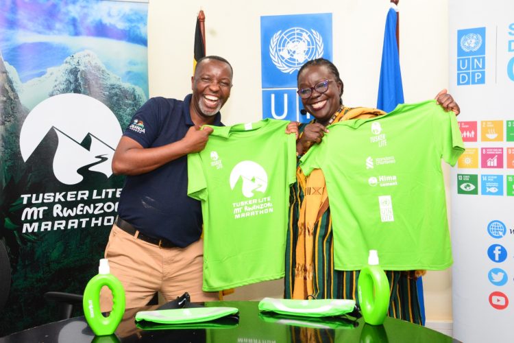 Amos Wekesa (left) and Elsie Attafuah during the kit unveiling ceremony at the UNDP headquarters.