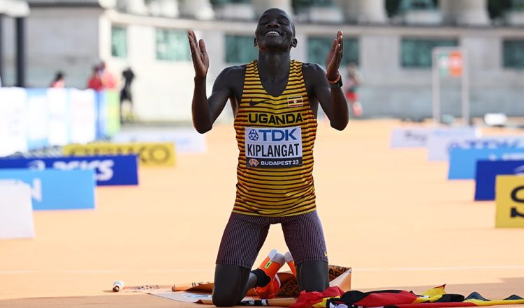 BUDAPEST, HUNGARY - AUGUST 27: Victor Kiplangat of Team Uganda celebrates at the finish line after winning the Gold medal in the Men's Marathon during day nine of the World Athletics Championships Budapest 2023 on August 27, 2023 in Budapest, Hungary. (Photo by Shaun Botterill/Getty Images)