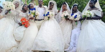 Hajji Habibu Nsikonnene and his seven wives.