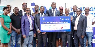 Sam Ntulume, Acting Managing Director I&M Bank Uganda (center), Entebbe Golf Club Captain- Walusimbi Serwano, and Francis Kamau- CEO & Principal Officer of GA Insurance Uganda Limited, pose for a photo moment with other sponsors at the announcement of new sponsors for the Katogo Golf Series.