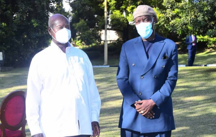 L-R: President Yoweri Museveni and Eddy Kenzo.
