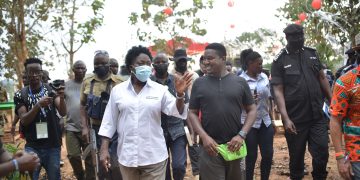 Kadaga is taken on a tour of the 2022 Nyege Nyege festival by Hillary Baguma - UBL's brand manager, Mainstream.