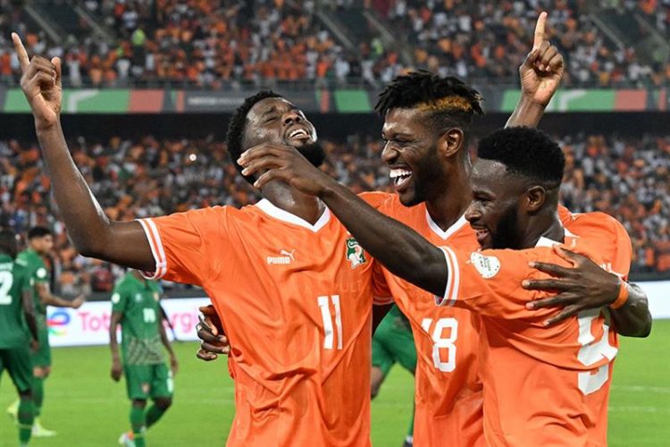 Ivory Coast players celebrating a goal.
