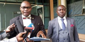 Petitioner Mr Michael Aboneka (L) together with his lawyer Mr George Musisi (R) at the Constitutional Court.