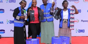 Wangechi Gitahi, Unilever Uganda’s CSP Manager, (second left) hands over an assortment of Unilever items to the women who are helping keep Kampala City clean. Unilever Uganda has highlighted the invaluable efforts of women who work tirelessly to keep Kampala city clean.