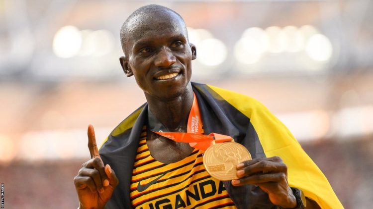 Joshua Cheptegei with his Olympic gold medal. Photo Credit GettyImages.