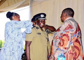 Minister for Internal Affairs, Gen (rtd) Kahinda Otafiire and the new Inspector General of Police, Abas Byakagaba during the handover ceremony at the police headquarters in Naguru.