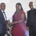 Dr Alan Shonubi, a senior partner at Shonubi, Musoke & Co. Advocates receives a lifetime achievement award at the IFLR Africa Awards held in Johannesburg, South Africa. Looking on is former UBL MD Nyimpini Mabunda.