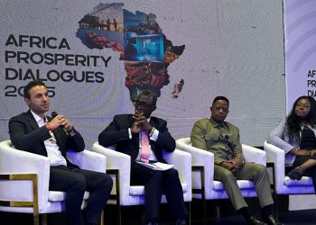 Abiola Bawuah, first from Right. With her are Group CEO of Telecel, Moh Damush, (with microphone), the Director-General of SSNIT, Kofi Bosompem Osafo-Marfo, and Hon. John Peter Amewu, Minister for Railway Development in Ghana.