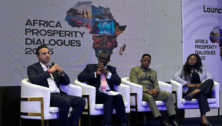 Abiola Bawuah, first from Right. With her are Group CEO of Telecel, Moh Damush, (with microphone), the Director-General of SSNIT, Kofi Bosompem Osafo-Marfo, and Hon. John Peter Amewu, Minister for Railway Development in Ghana.