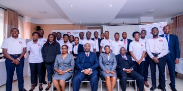Clare Gatabi Mugabi, Head, Marketing and Corporate Communications, Anthony Kituuka Managing Director, Elizabeth Wahito and Eliud Njogu from E&M Technologies pose for a a group photo with ELP Scholars at Eureka Place Hotel in Ntinda on Tuesday.